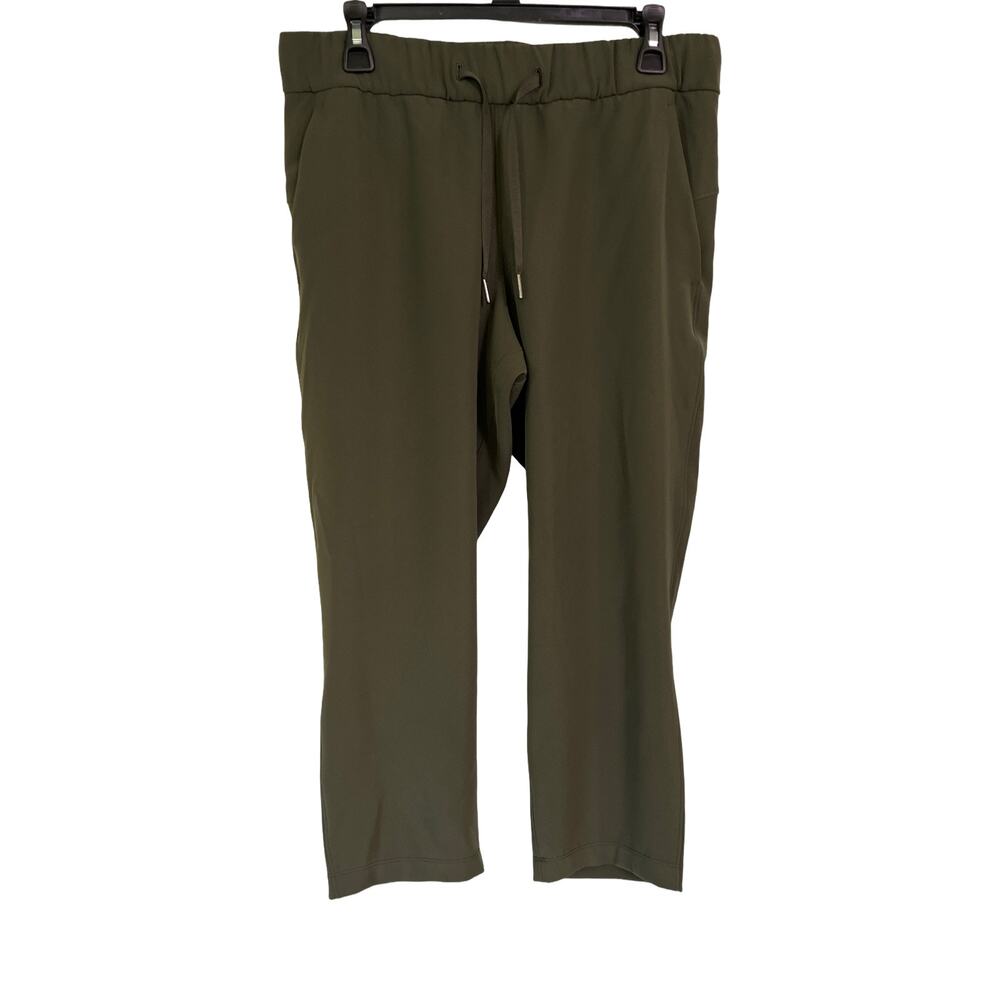 Lululemon On The Fly Crop Olive Green Pants Womens 8 Elastic Waist Travel